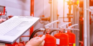 Checks men's fire extinguishers